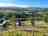 Cantref Campsite: Visitor image of the views over the campsite towards the mountains 