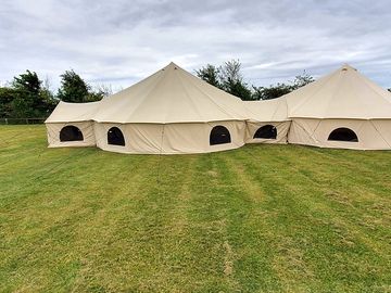 Apartment tent is three bell tents linked toegther