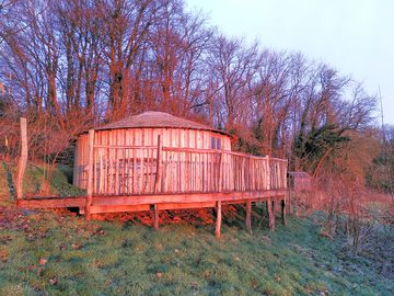 The wooden yurt at sunrise
