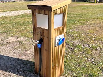 Water and electric hook-ups with automatic night lights and smart metres on every pitch