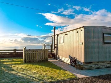 Shepherd's huts by the sea