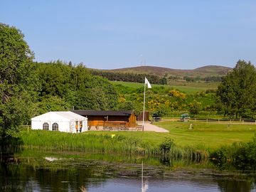 Clubhouse next to the pond