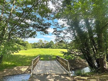 Bridge over the river frome into the camping field