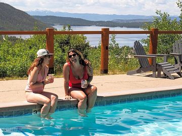 Swimming pool with lake views