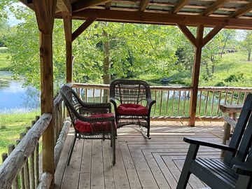 Wooden deck with pond views