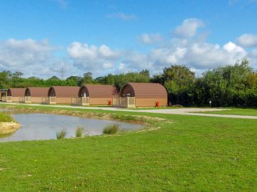 Grass touring/tent pitches by the lake