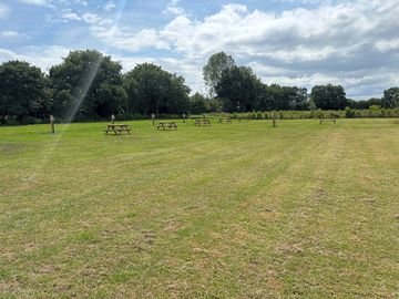 Picnic benches for all guests