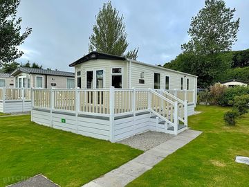 Exterior of a beech 2 bedroom static caravan with decking