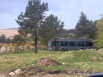 The shuttle bus nestled into the landscape with spectacular views across bodmin moor