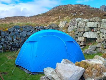 Sheltered tent pitch