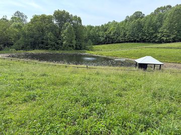 Powered site overlooking the pond