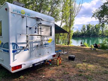 Pitch at the water's edge