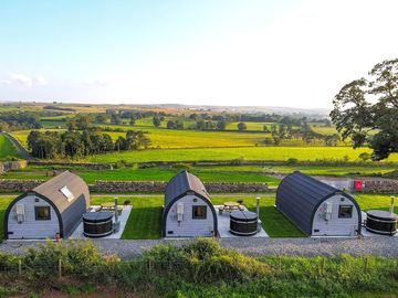 View across the pods to the green countryside