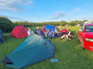 Solo/back packers pitched. what a lovely group of friends enjoying their stay at pumllog