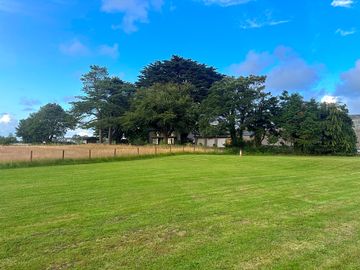 Spacious touring pitches on grass