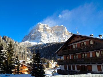 Traditional buildings and impressive mountains