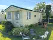 Outside view of 2 bedroom caravan with seating (added by manager 01 Jun 2024)