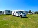 Motorhome pitches were a bit scruffy and next to the bins
