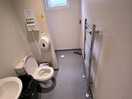 Intergraded toilet, shower and sink for privacy, and very clean.