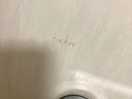 Tap instructions written on wall