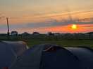 Day one sunset early may