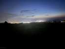 Lights over the hill at midnight