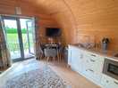 Kitchen and seating area with smart tv