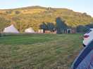View from our pitch to the kitchen, shower, loo and beyond