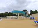 View of pool area and slides