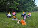 Eating marshmallows around the camp fire.