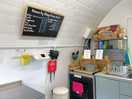 Reception area with price list and paying machine