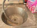 Sink being used as the drain from the washing machine.