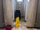 Toilets being cleaned