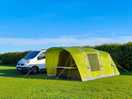 Our pitched tent and battle bus