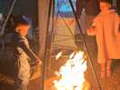 Toasting marshmallows and melting chocolate for dipping our fruit kebabs