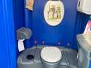 Portaloo clean functional with seaside post card humor