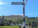 Follow this sigh towards seathwaite for a very short distance to get to the site