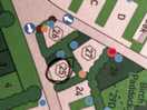 Bell tents sandwiched by roads opposite main entrance