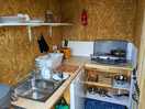 External kitchen, where a welcome pack of tea, coffee, milk, bread, welsh cakes etc was left for us