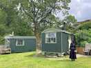 Front view of the glamping huts.