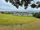 Walk over the fields behind the site, from dog walking field.