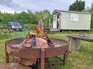 Relaxing fireside by mary's shepherd's hut. lovely!