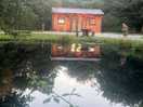 Kingfisher pond and cabin .