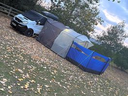 Our van all set up complete with awning massive plot