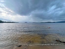On the edge of the loch.