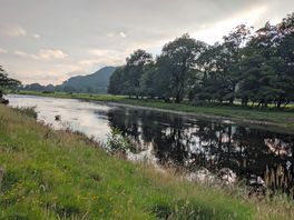 River showing the tent pitches by the river.