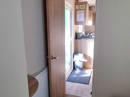 Inside: from main bedroom to kitchen