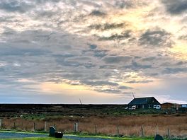 Sun setting over the site