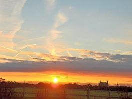 Sunrise view from the front of the van.
