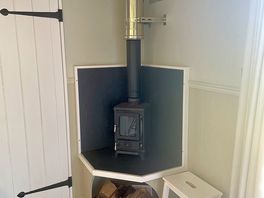 Little log burner for cold nights. not needed as was so warm. they even supply a hot water bottle